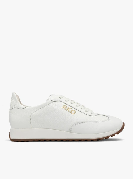 White sporty shoes with decorative embroidery