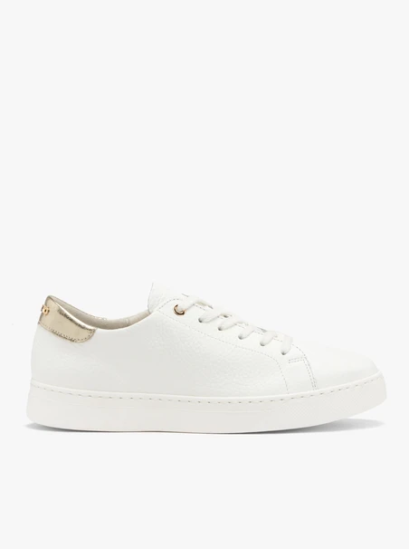 White sporty shoes with a platinum heel tab