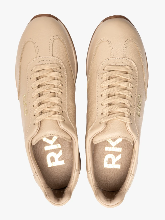 Beige sporty shoes with decorative embroidery