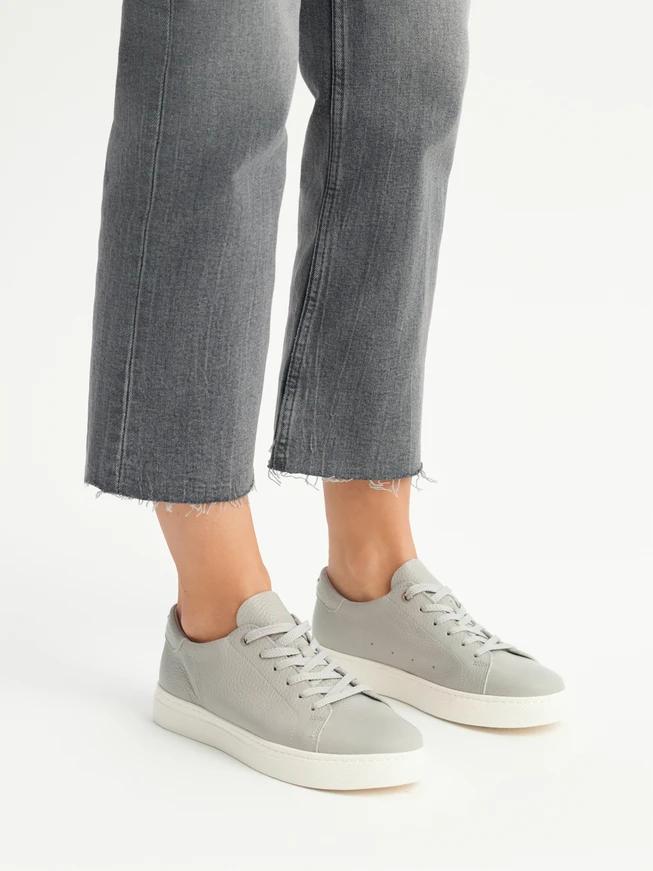 Gray sporty shoes with lightweight white sole