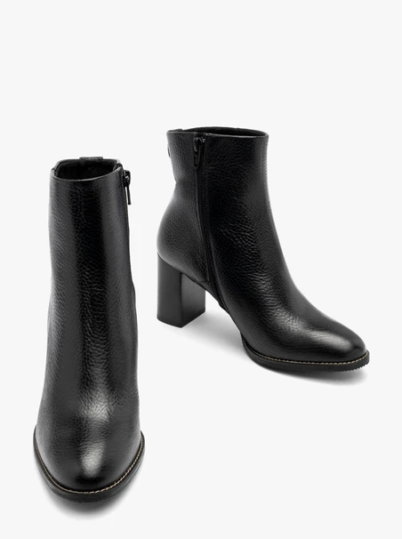 Black block-heel women’s ankle boots with leather paneling