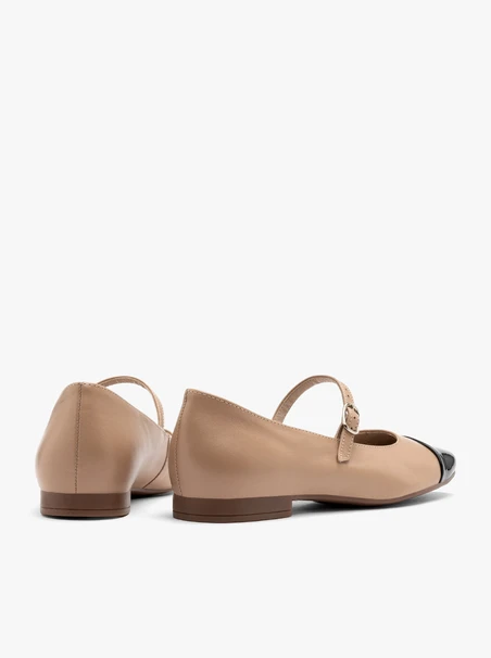 Beige ballerinas with contrasting black toe