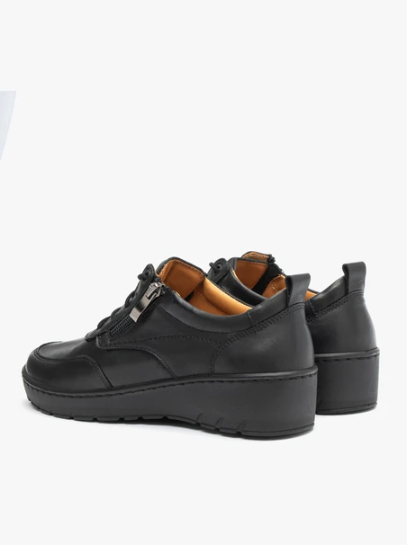 Schwarze niedrige Plateauschuhe für Frauen