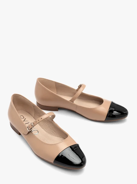 Beige ballerinas with contrasting black toe