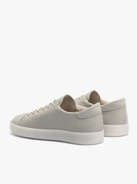 Gray sporty shoes on a flat sole