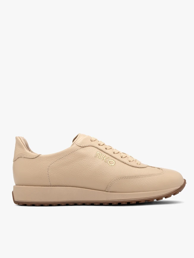 Beige sporty shoes with decorative embroidery
