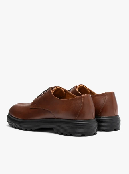 Braune Herrenhalbschuhe mit leicht schwarzem Boden