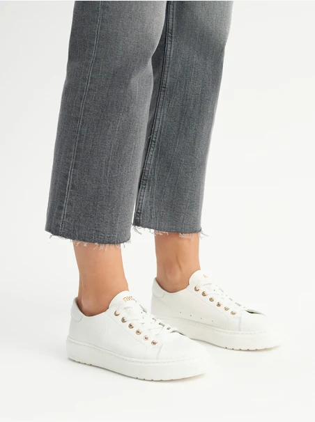 White sporty shoes with lightweight sole