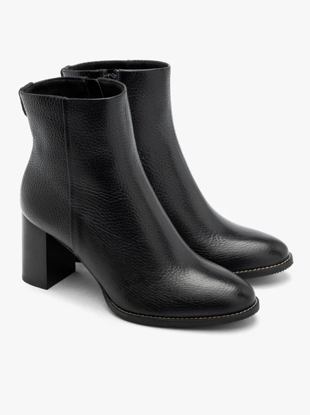 Black block-heel women’s ankle boots with leather paneling