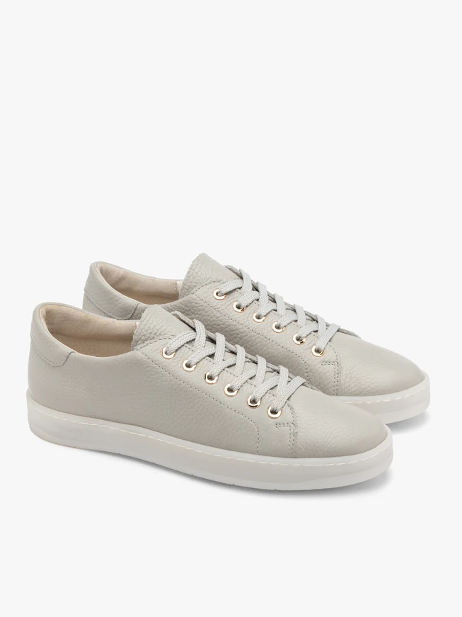 Gray sporty shoes on a flat sole
