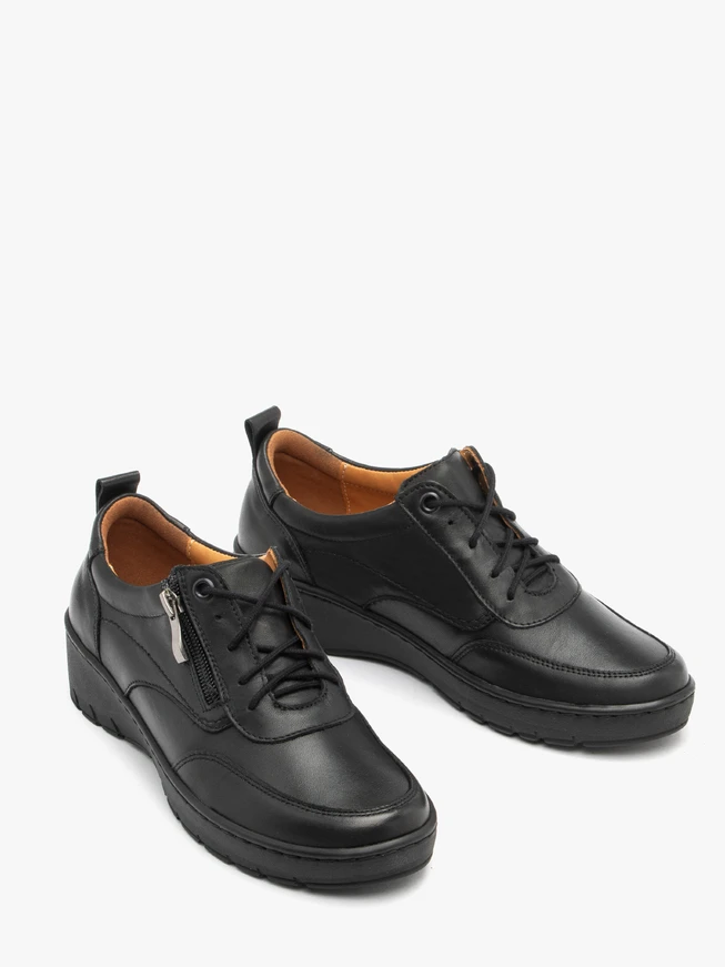 Schwarze niedrige Plateauschuhe für Frauen