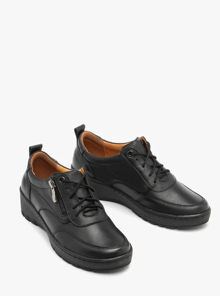 Schwarze niedrige Plateauschuhe für Frauen