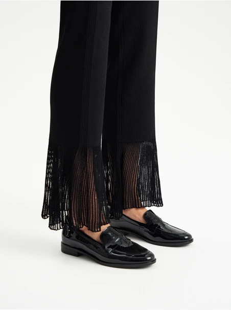 Black patent loafers with flat sole