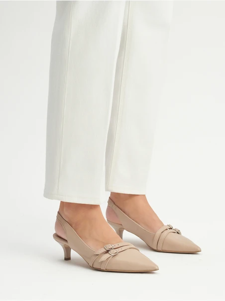 Beige slingback pumps with decorative straps