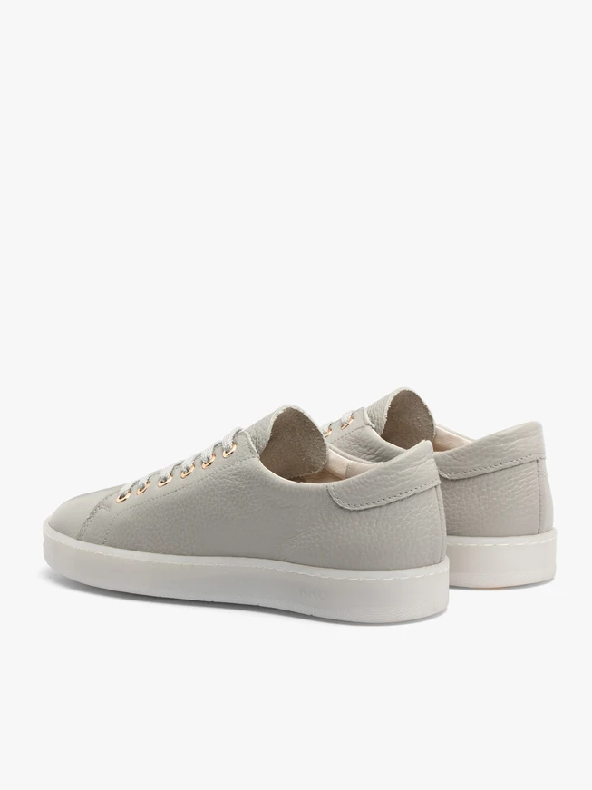 Gray sporty shoes on a flat sole