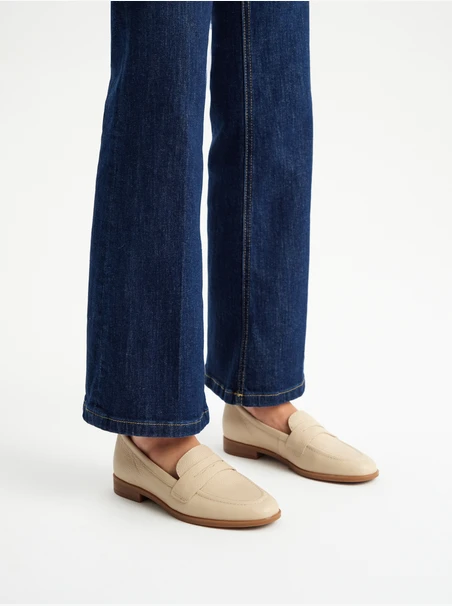 Beige women’s flat loafers