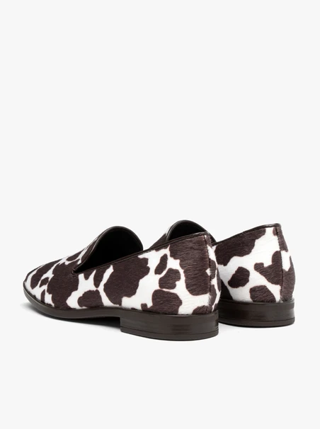 Cow print moccasins