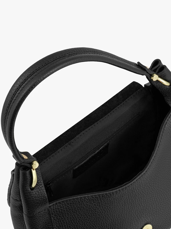 Schwarze elegante mittlere Handtasche