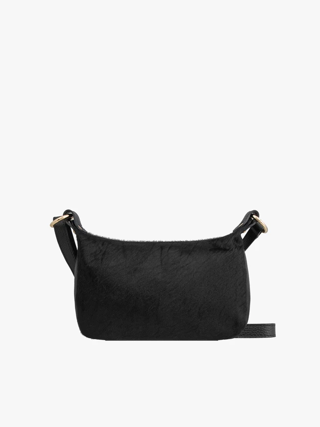 Schwarze Ledertasche mit Borsten