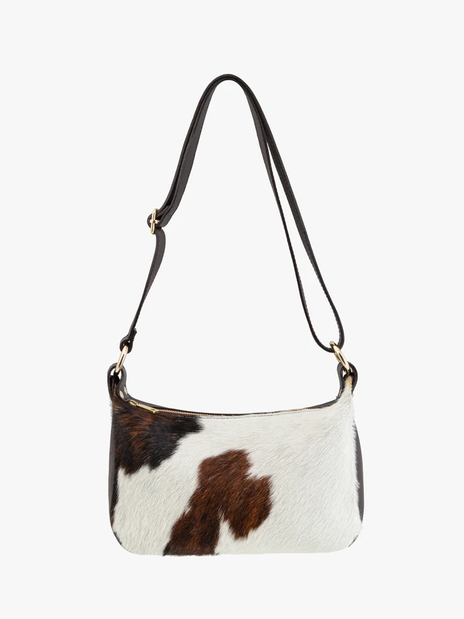 Medium-sized crossbody bag with cow print