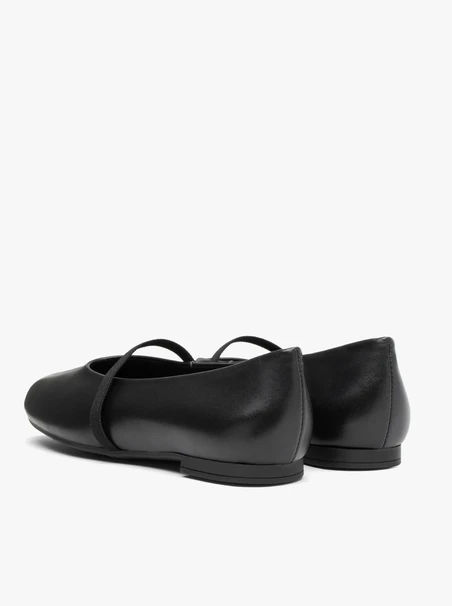 Black minimalist ballet flats with elastic