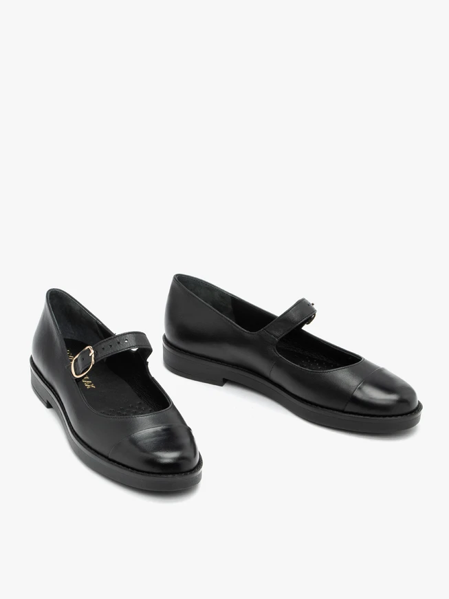 Schwarze Ballerinas mit Riemen und Schnalle