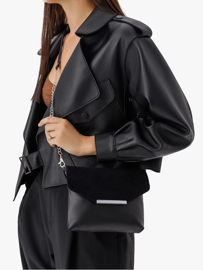 Kleine schwarze Clutch-Tasche mit Kette
