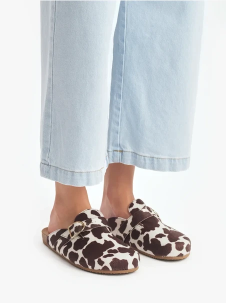 Cow-print women’s mules