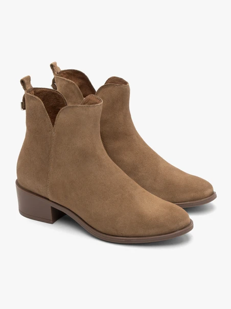 Beige women’s ankle boots with decorative shaft