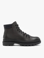 Dunkelbraune isolierte Stiefel