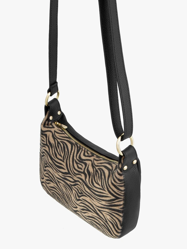 Handtasche mit schwarzem und beigem Tiermuster