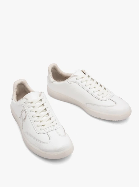 White sporty shoes with decorative embroidery