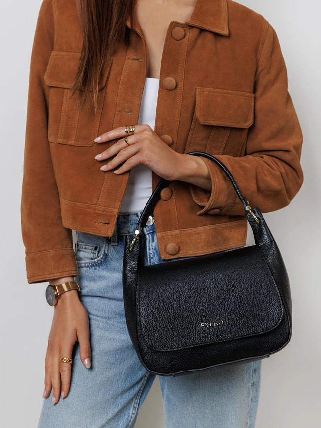 Schwarze elegante mittlere Handtasche