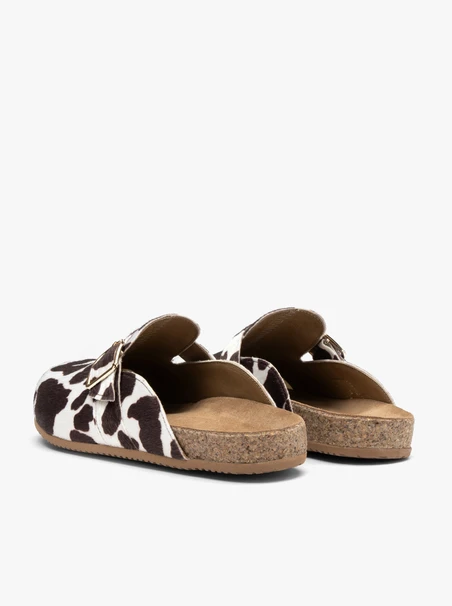 Cow-print women’s mules