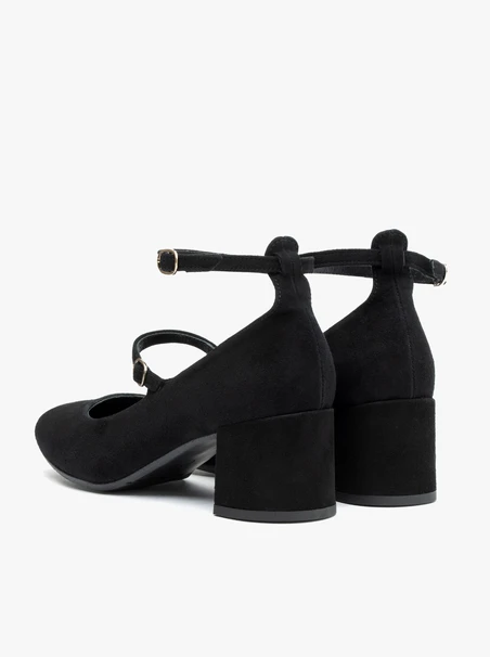 Women’s black suede pumps
