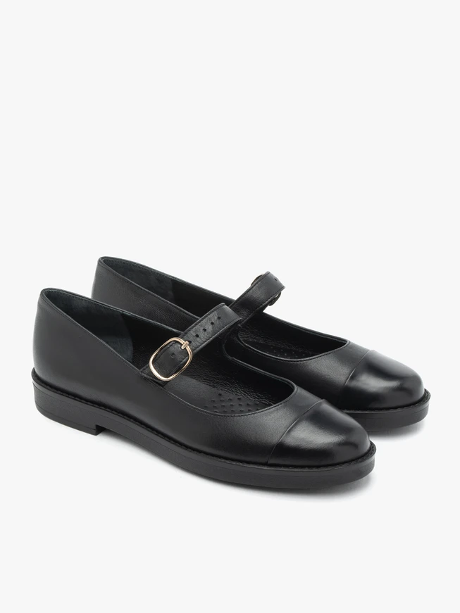Schwarze Ballerinas mit Riemen und Schnalle