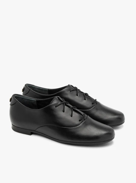 Schwarze Halbschuhe mit flachem Boden