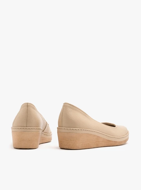 Beige platform pumps
