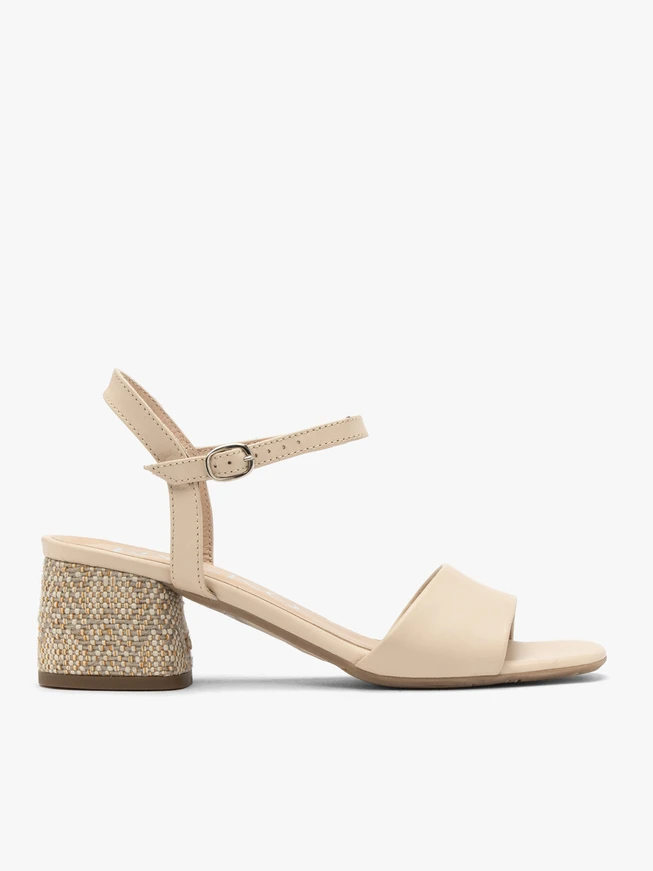 Beige sandals with decoratively covered heel