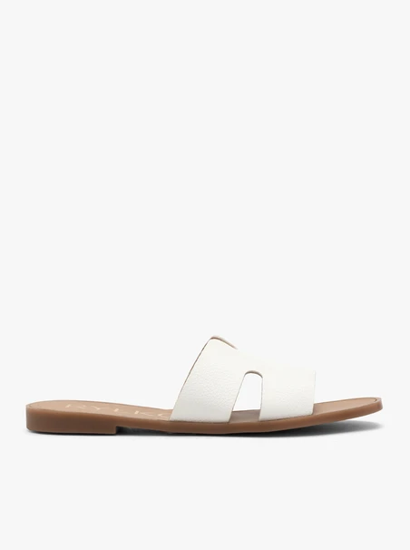 White women’s cutout slides