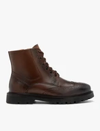Braune Lederstiefel mit Perforationen