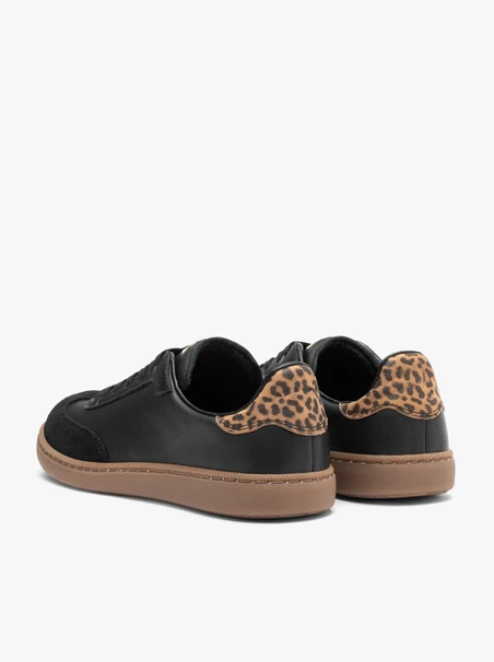 Schwarze Turnschuhe aus gebondetem Leder
