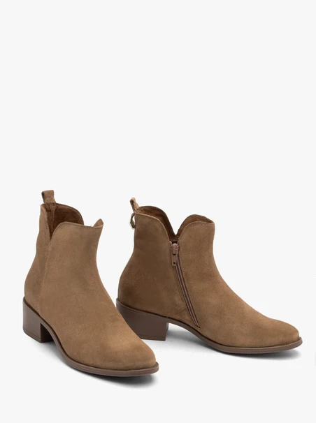 Beige women’s ankle boots with decorative shaft
