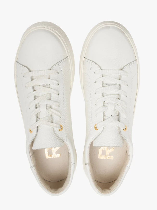 White half sports shoes with gold details