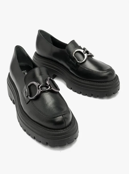 Black loafers with ornament