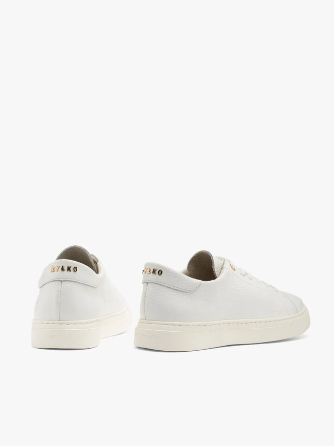 White sporty shoes with gold details