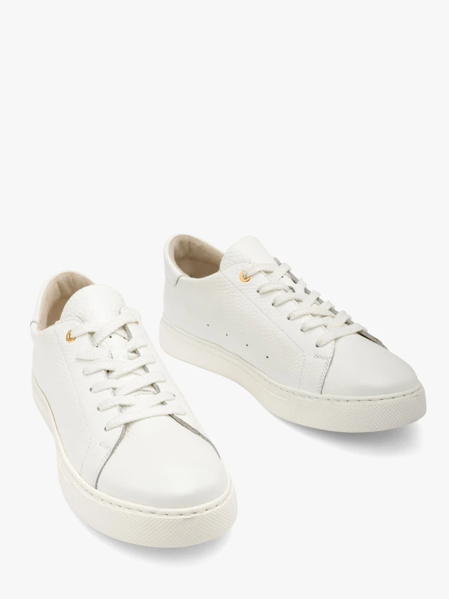 White half sports shoes with gold details