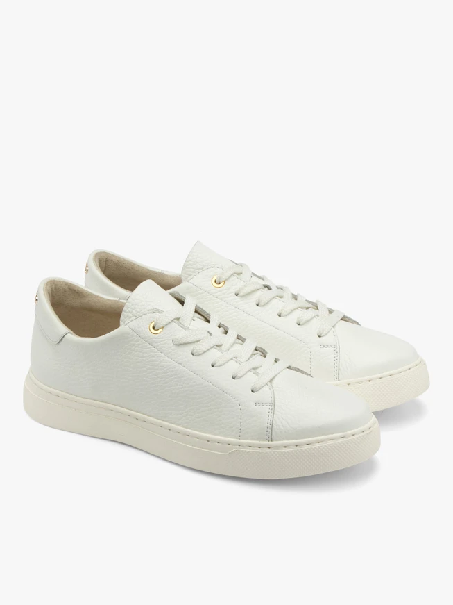 White sporty shoes with gold details