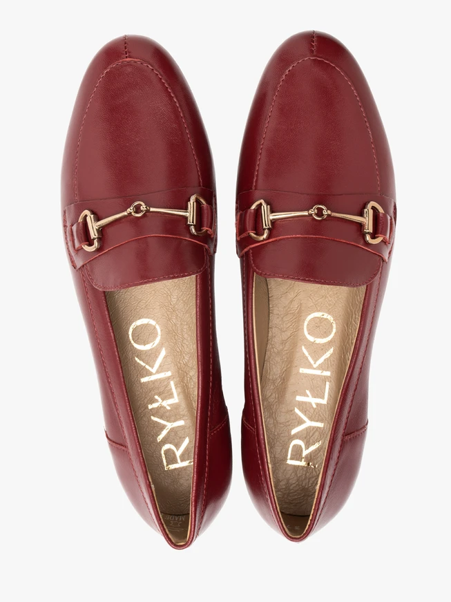 Maroon moccasins with platinum embellishment