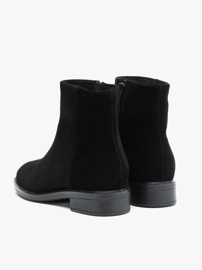 Schwarze flache Veloursstiefel
